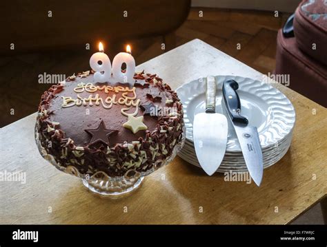 birthday chocolate cake 90th birthday with candles Stock Photo - Alamy