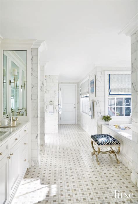 Traditional White Bathroom with Marble Wall Tiles - Luxe Interiors + Design