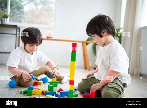 Children Playing With Blocks Stock Photo Alamy