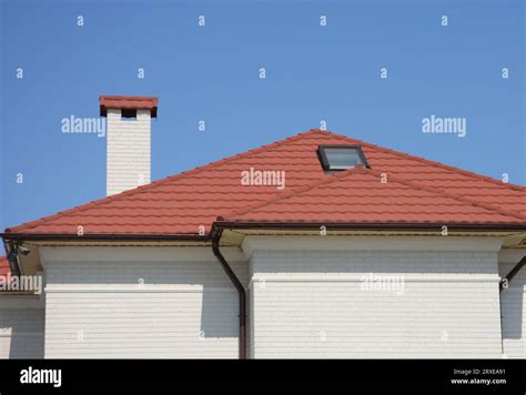 House Red Ceramic Tiles Rooftop With Attic Skylight Window Rain Gutter