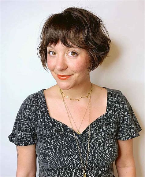 Chic Short Layered Bob With Bangs For An Eye Catching Crop