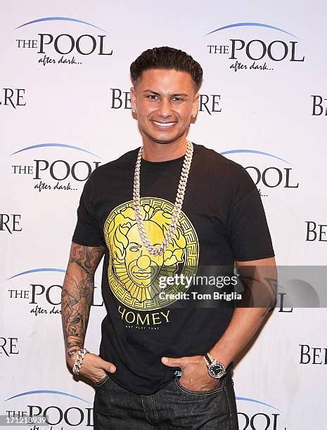 78 Pauly D Visits The Pool After Dark Stock Photos High Res Pictures