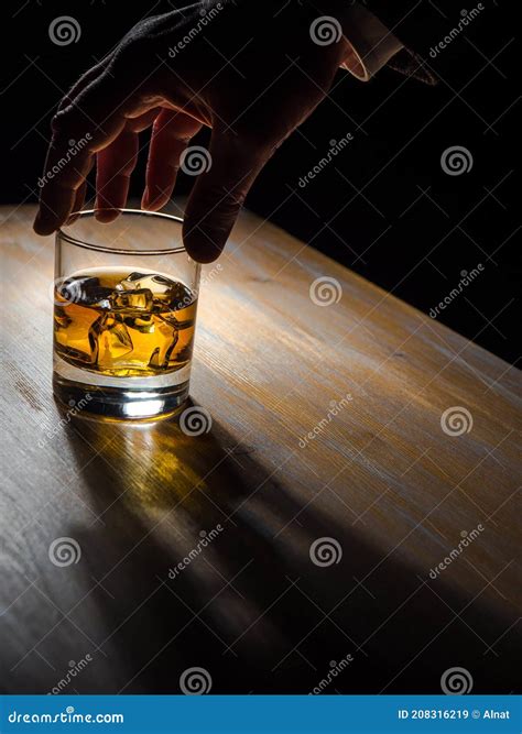 Man S Hand Holding A Glass Of Whisky Stock Image Image Of Room Shirt