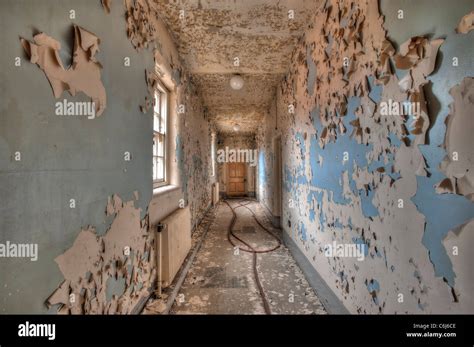 Corridor In The Lunatic Asylum Wing Of A Derelict Hospital Stock Photo