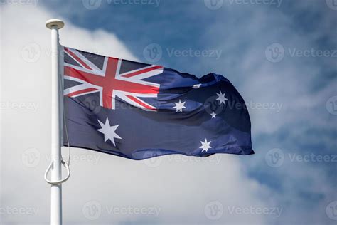 isolated australia flag while waving 12553801 Stock Photo at Vecteezy