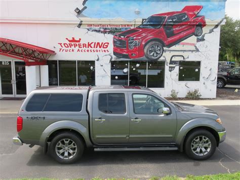 Nissan Frontier Leer 100xl With Nerf Bars Topperking Topperking Providing All Of Tampa Bay