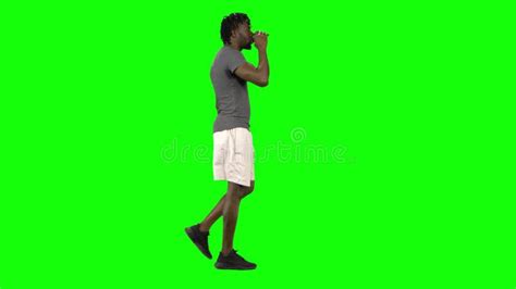 African American Man is Running at Green Screen, Chroma Key. Profile ...