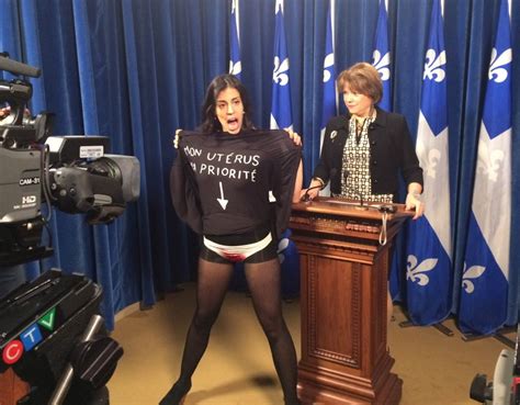 Topless Woman Crashes Quebec Minister S News Conference CTV News