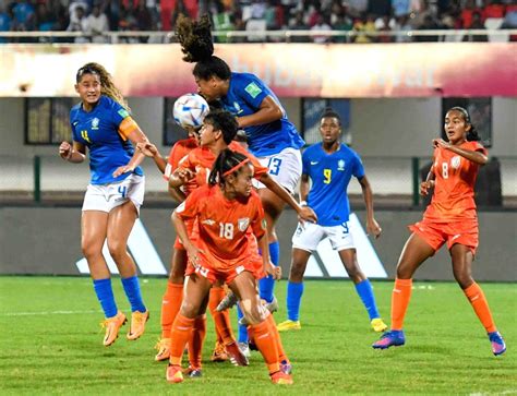 Bhubaneswar Brazil And Indian Players Vie For The Ball During Their