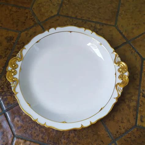 GRAND PLAT ROND creux en porcelaine Limoges Haviland modèle doré à la