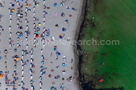 Grömitz from the bird s eye view Beach chair on the sandy beach ranks