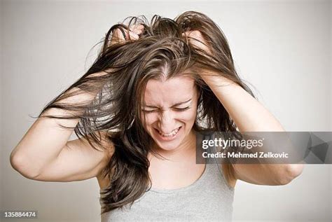 Pulling Hair Photos And Premium High Res Pictures Getty Images