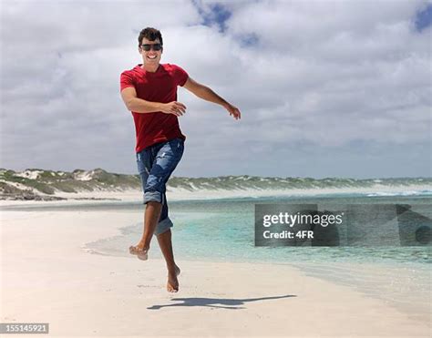 man skipping fun stock  high res pictures  images