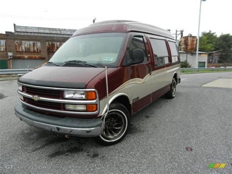 2000 Dark Carmine Red Metallic Chevrolet Express G1500 Passenger Conversion Van 55283735 Photo