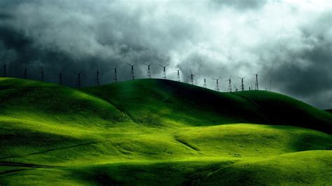 Green Grass Slope Scenery Background Black White Clouds Sky Hd Nature