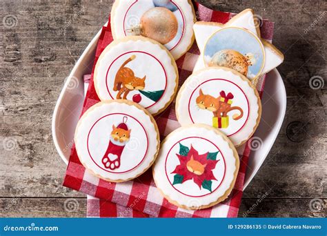 Christmas Butter Cookies Decorated With Christmas Graphics On Wood