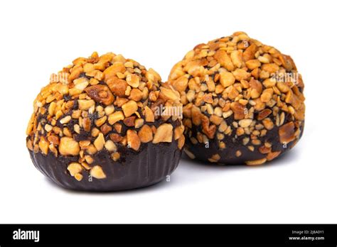 Cake Rum Truffle Two Balls With Chopped Nuts Isolated On The White