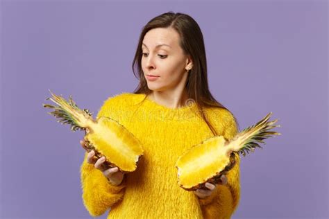 Pretty Young Woman In Fur Sweater Hold In Hands Looking On Halfs Of