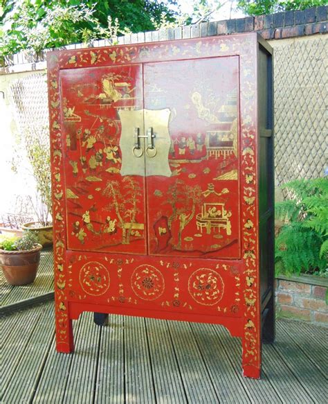 Late 19th Century Chinese Red Lacquer And Gilded Wedding Cabinet