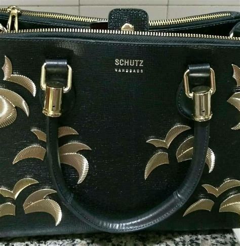 Bolsa Feminina Lorena Preta De Couro Enfeites Em Metal Dourado