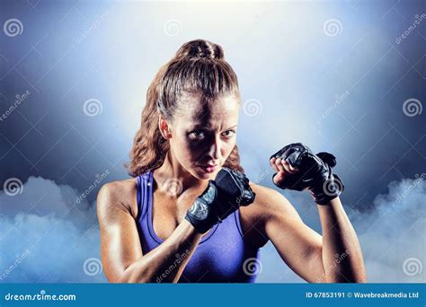 Composite Image Of Portrait Of Female Confident Boxer With Fighting