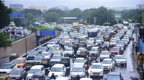 Mumbai rain | Massive traffic snarl as roads inundated; local trains ...