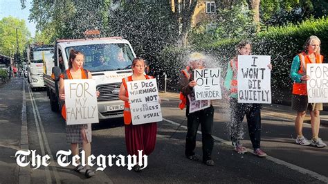 Just Stop Oil Protesters Soaked As Water Is Thrown On Them Youtube