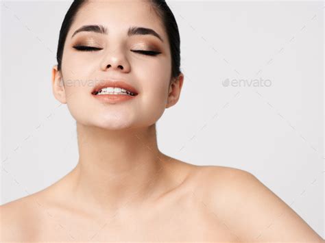 Brunette With Bare Shoulders Closed Eyes Cosmetics Glamor Model Stock