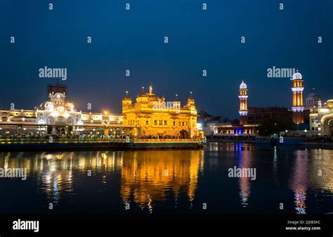 The Clock Tower And Gothic Style Entrance To The Gilded Golden Temple