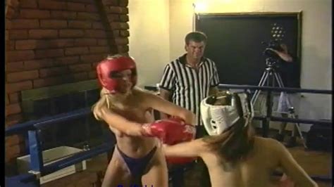 Catfight Fierce Topless Female Boxing With Hard Punches To The Breast Head Belly And Ribs To A