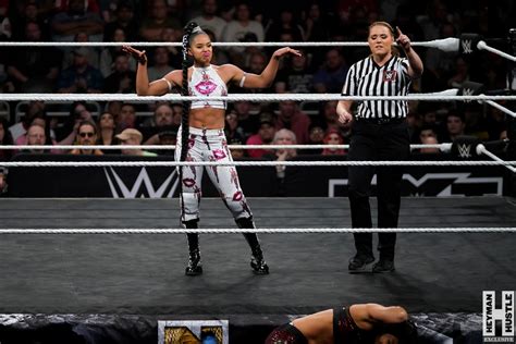 Hustle Photo Book NXT Womens Champion Shayna Baszler Vs Bianca Belair