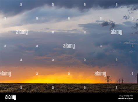 Epic Sunset With Rural Landscape With High Voltage Line Stock Photo Alamy