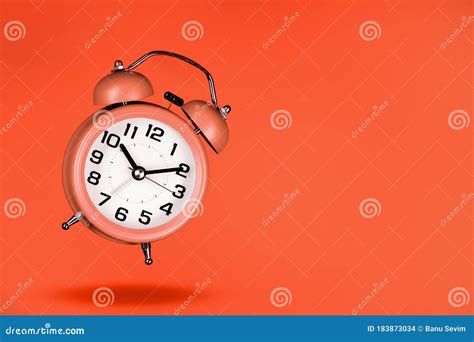 Orange Alarm Clock On Orange Background Stock Photo Image Of