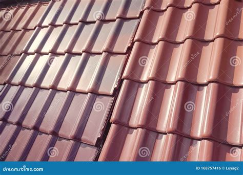 Samples Of Ceramic Roofing Tiles In A Warehouse Of A Roofing Mat Stock