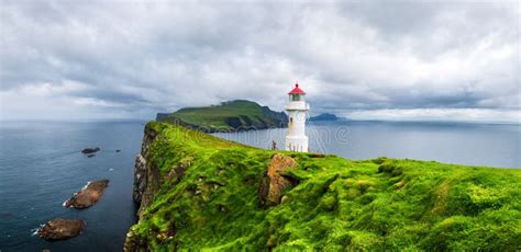 Lighthouse at mykines stock image. Image of mykines - 232670523