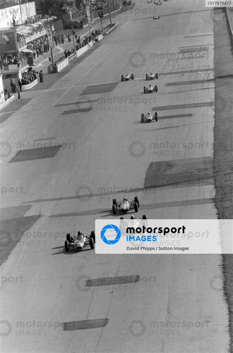 Graham Hill BRM P261 Leads Jackie Stewart BRM P261 And Jim Clark