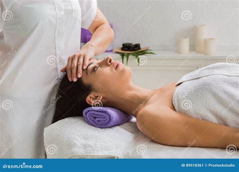 Woman Beautician Doctor Make Head Massage In Spa Wellness Center Stock