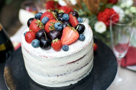 Delicious Festive Naked Cake With Butter Cream The Cake Is Decorated With Fresh Blueberries