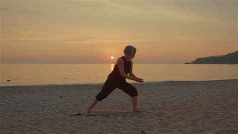 Young Woman Practicing Yoga On Ocean At Stock Footage Sbv 347430923