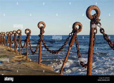 Old Rusty Bollards At Newcastle Beach Australia Stock Photo Alamy