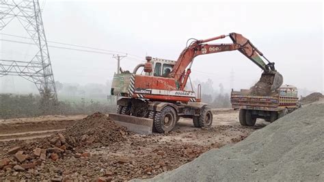 Transporting Heavy Equipment Doosan 100w Excavator Digging Gravel