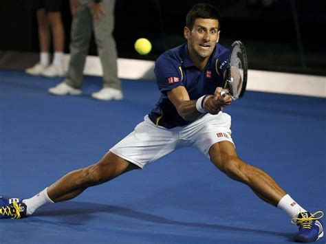 Video Djokovic Slides Into Brilliant Split Legged Backhand Pass