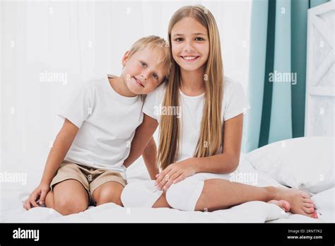 Blonde Siblings Looking Camera Stock Photo Alamy