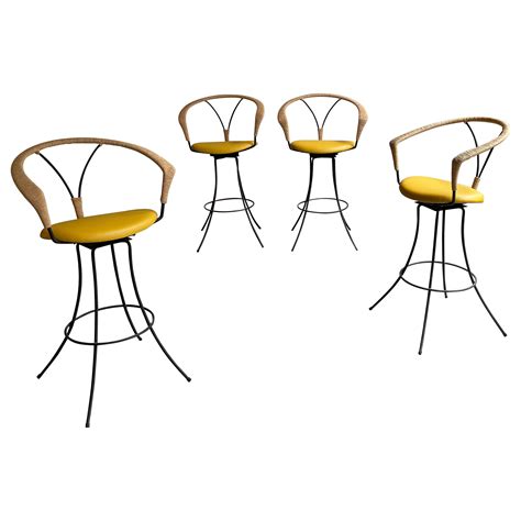 Pair Of Mid Century Modern Wrought Iron And Leather Swivel Bar Stools