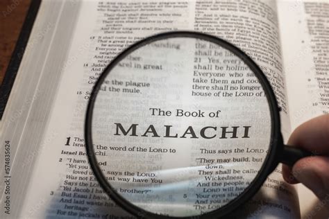 Title Page Book Of Malachi Close Up Using Magnifying Glass In The Bible