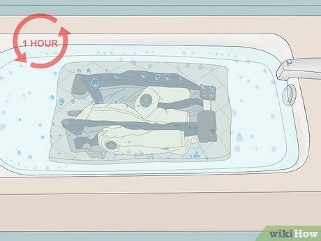 3 manières de nettoyer un lit parapluie - wikiHow 