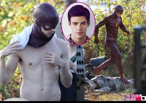 A Shirtless Grant Gustin Filming Scenes On The Set Of The Flash In