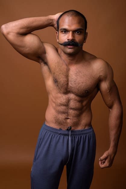 Premium Photo Portrait Of Muscular Indian Man With Mustache Shirtless