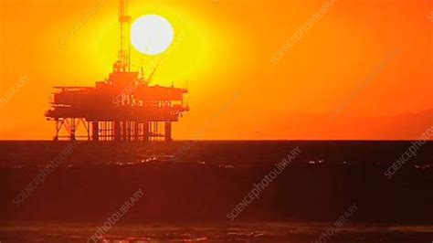 Offshore Oil Platform At Sunset Stock Video Clip K0020933