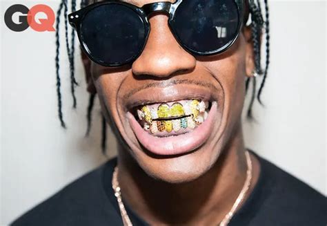 Travis Scott Grillz Everything You Need To Know About His New Teeth